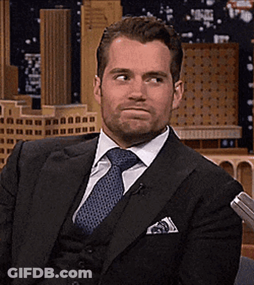 Actor Henry Cavill Shaking Head Reaction GIF