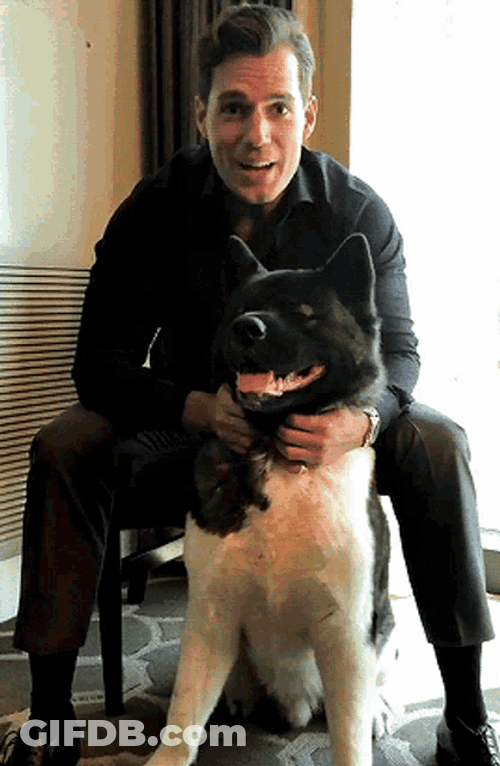 Actor Henry Cavill Sitting With Dog Kal GIF