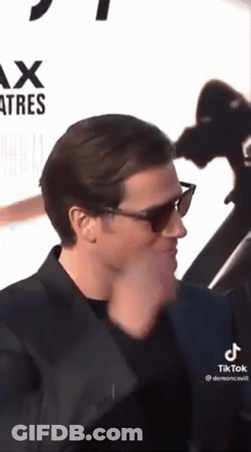 Actor Henry Cavill Taking Off Sunglasses GIF