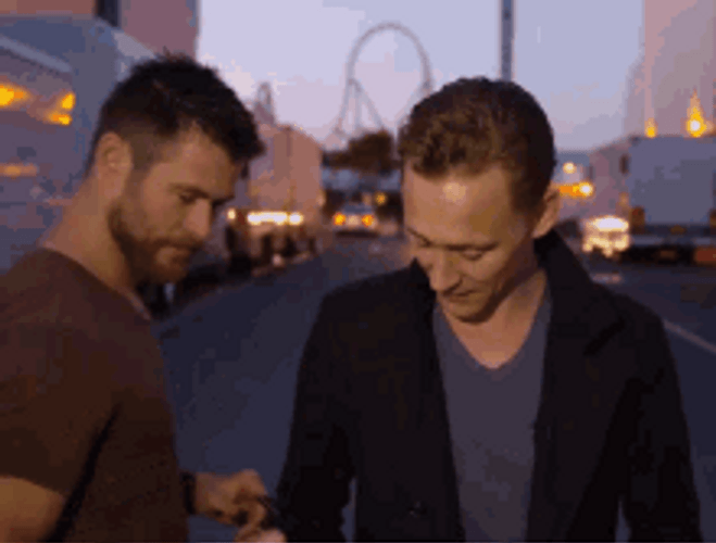 Actors Chris Hemsworth And Tom Hiddleston GIF