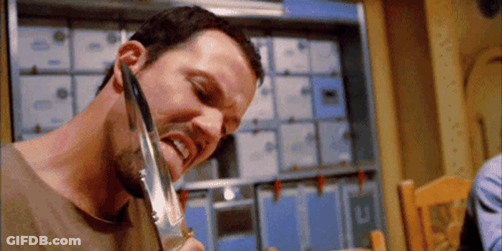 Adam Baldwin Licking A Knife GIF