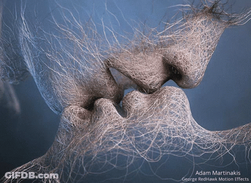 Adam Martinakis George Redhawk Motion Effects Shows A Kissing Couple GIF