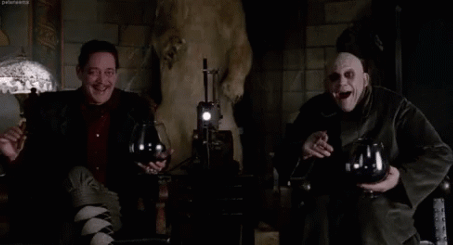 Addams Family Uncle Fester Gomez Laugh GIF