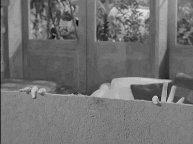 Addams Family Uncle Fester Howdy Funny Smile GIF