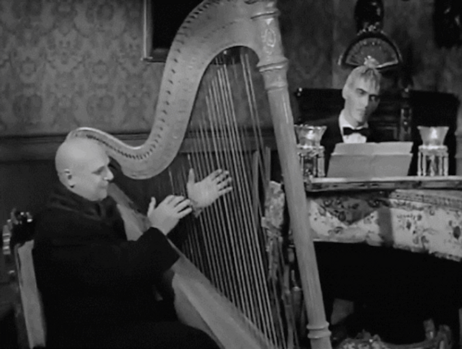 Addams Family Uncle Fester Lurch Lyre Music GIF