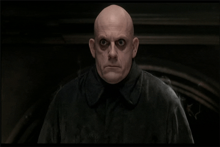 Addams Family Uncle Fester Serious Stare GIF