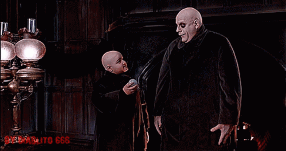 Addams Family Uncle Fester Weird Light Bulb GIF