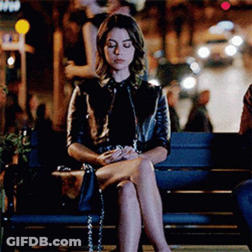 Adelaide Kane Sitting At The Park Bench GIF