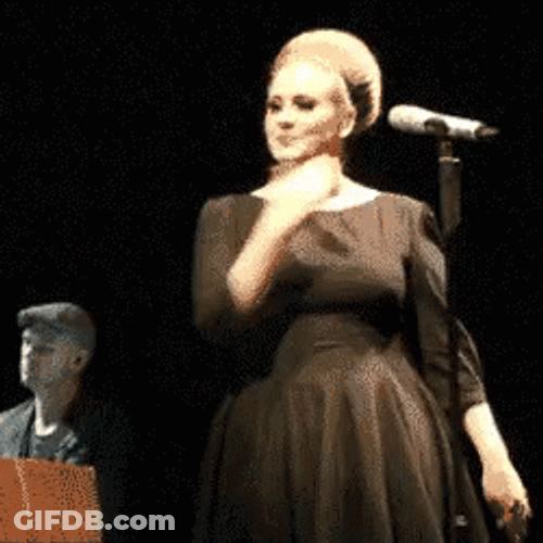 Adele Performing Shoulder Brush GIF