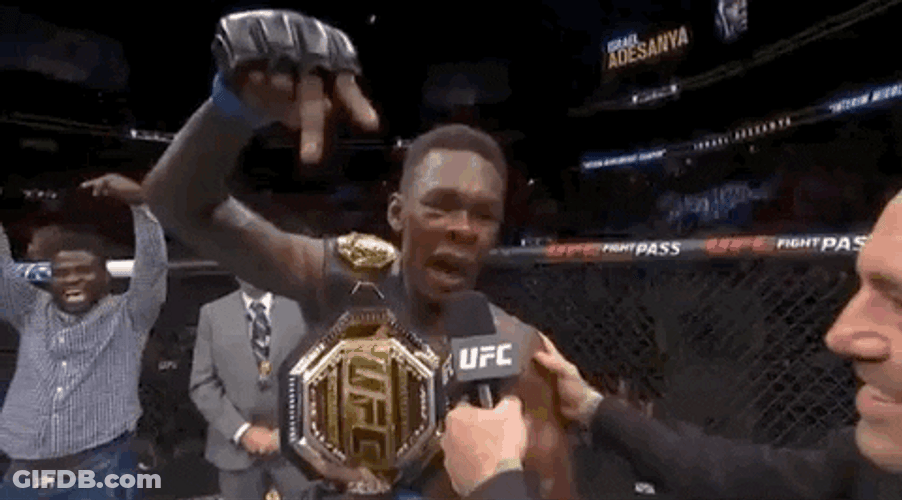 Adesanya Wearing Belt On His Shoulder GIF