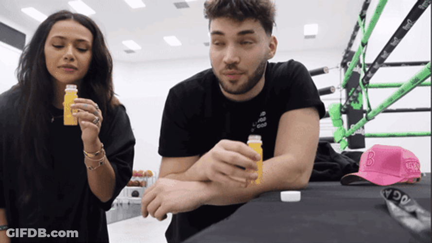 Adin Ross Drink Juice With Girl GIF