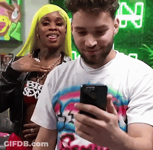 Adin Ross Sexyy Red Looking Something On Phone GIF