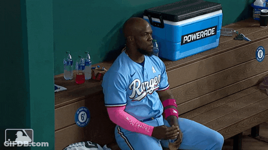 Adolis Garcia Chest Thump And Peace Sign GIF