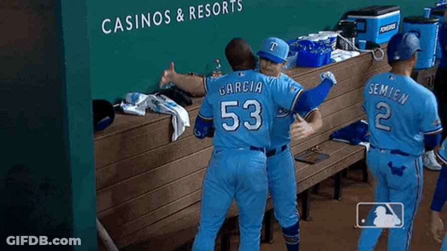 Adolis Garcia Hugging A Teammate GIF