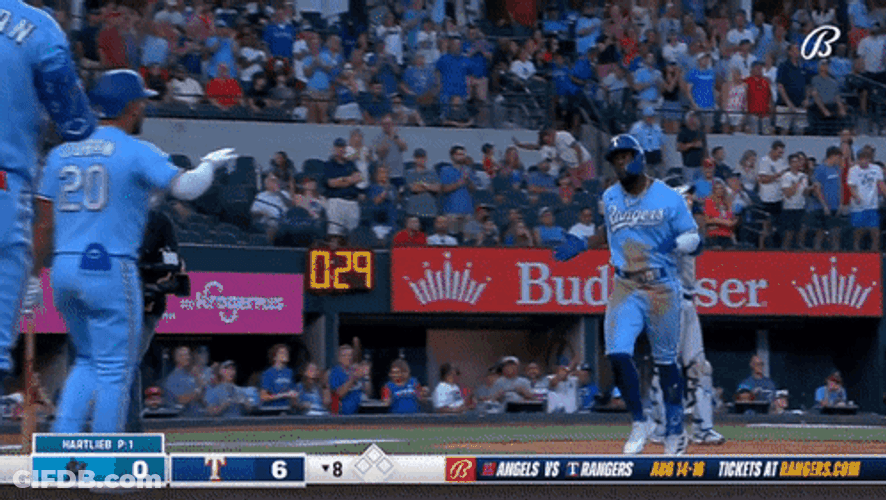 Adolis Garcia Making Contact With His Teammates GIF