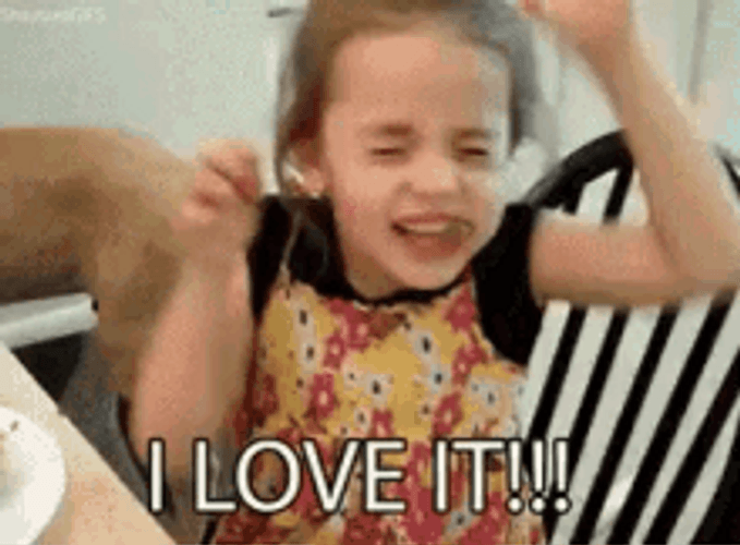 Adorable Cute Kid Eating I Love It Reaction GIF