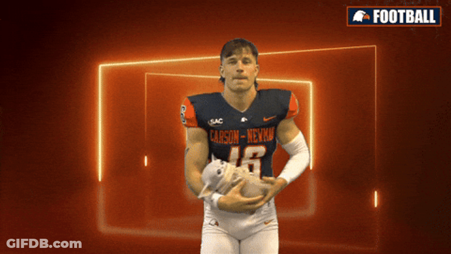 Adorable Footballer Making Heisman Pose GIF