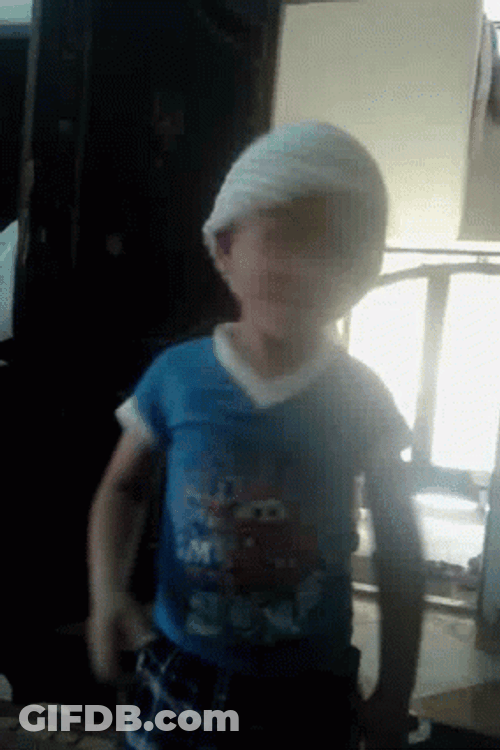 Adorable Kid Shaking Head No GIF