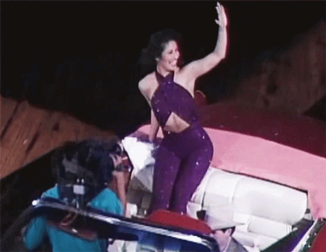 Adorable Selena Quintanilla Waving GIF