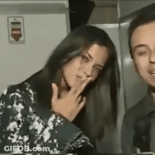 Adriana Lima Two Fingers Kiss GIF