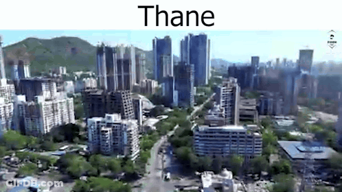 Aerial City View With Buildings And Trees GIF