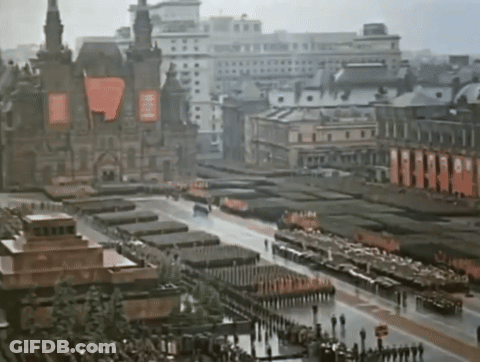 Aerial City With Buildings And People GIF
