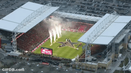 Aerial Soccer Stadium With Red Bull Logo GIF