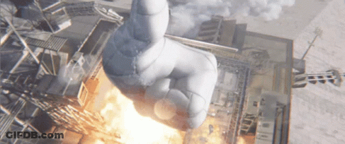 Aerial View Building With Giant Hand Thumbs Up GIF
