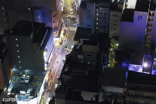 Aerial View City Night Building Says P GIF