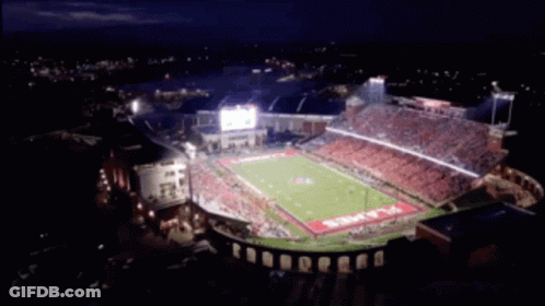Aerial View Football Stadium Night With Word Flame GIF