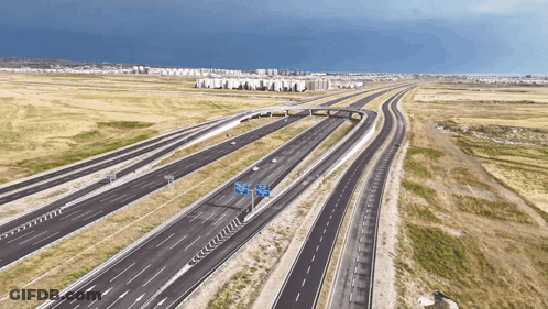 Aerial View Highway Intersection Blue Sign A GIF
