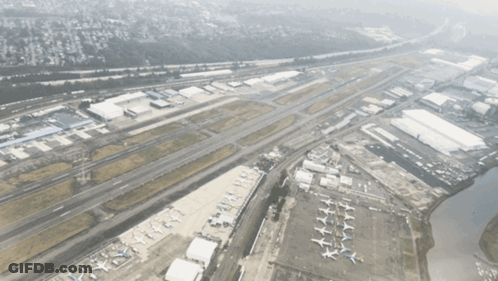 Aerial View Of City From Airplane Window With Niagara GIF