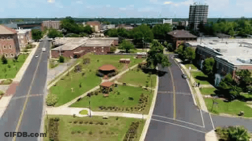 Aerial View Of City With Buildings And Trees GIF