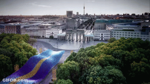 Aerial View Of City With Buildings And Trees GIF