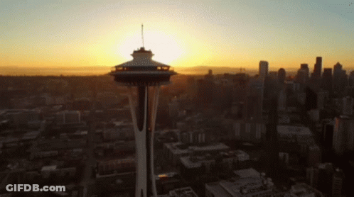 Aerial View Of City With Space Needle At Sunset GIF