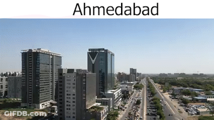 Aerial View Of City With Tall Buildings And Highway GIF