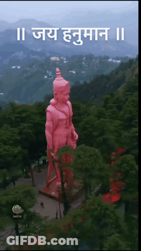Aerial View Of Hanuman Statue In Forest With Mountains GIF