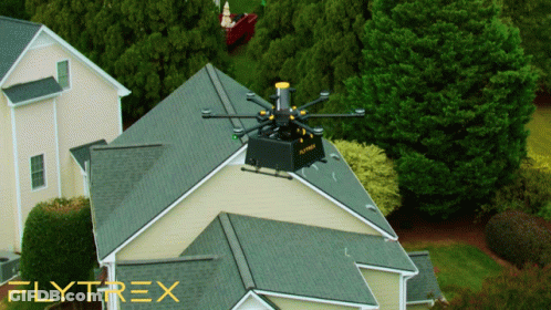 Aerial View Of House With Flytrex Logo GIF