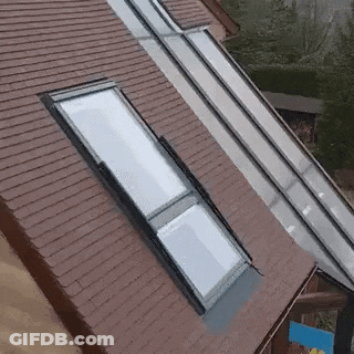 Aerial View Of Roof With Skylight And Gutter GIF