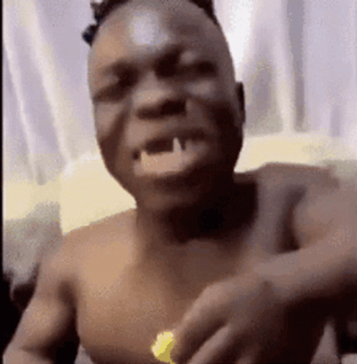 African Guy Laughing Hysterically GIF