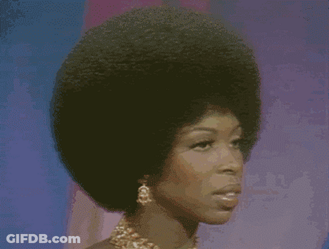 Afro Hair Styled Lady Slow Motion Turn GIF