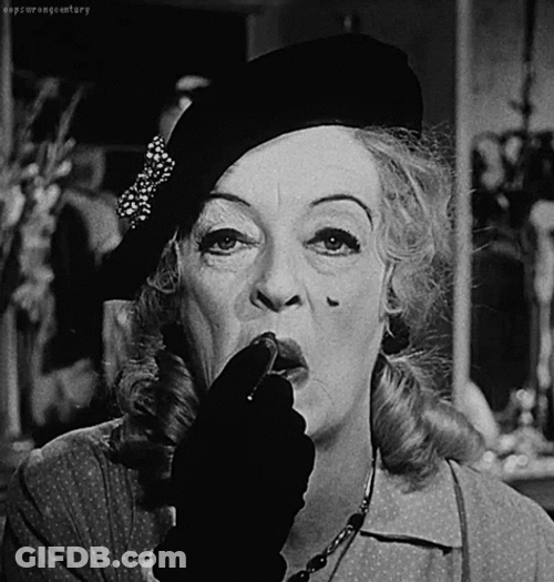 Aging Bette Davis Putting Lipstick GIF