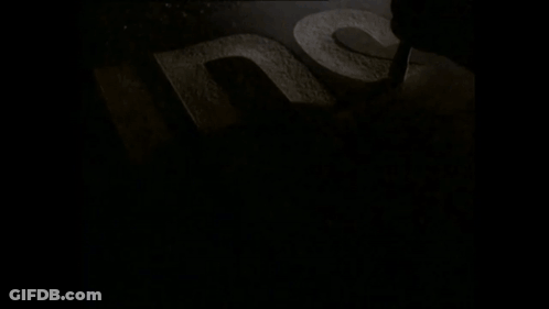 AIDS Sign White Letters GIF