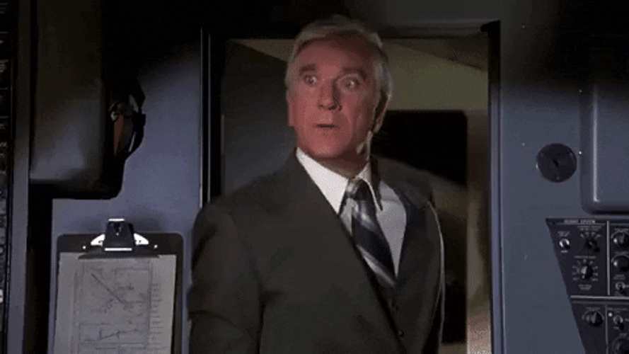 Airplane Movie Awkward Leslie Nielsen GIF