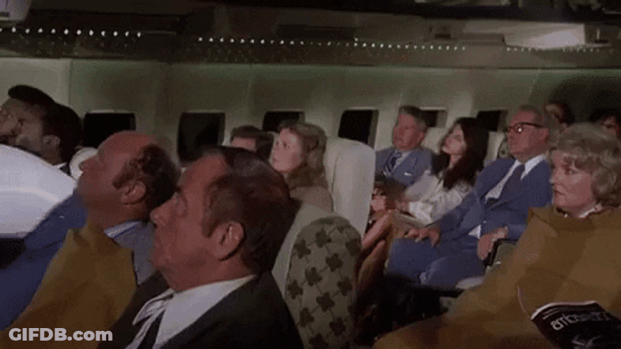 Airplane Movie Dragging A Body GIF
