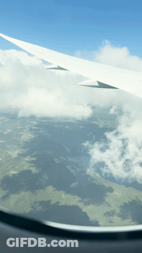 Airplane Wing In Sky GIF