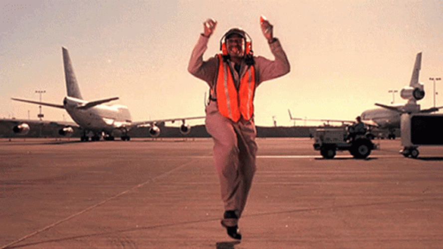 Airport Flight Worker Dancing Funny With Plane Onsite GIF