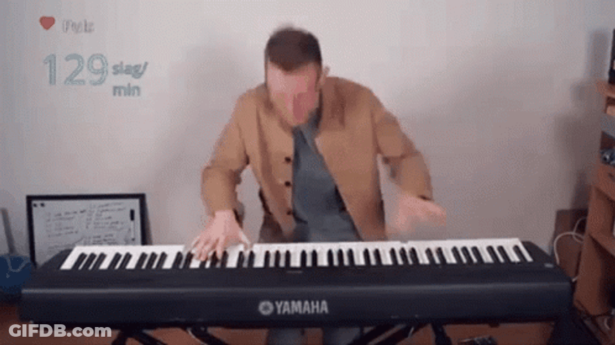 Akmigone Playing Piano GIF