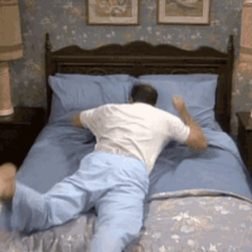 Al Bundy Whining On The Bed GIF