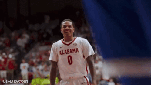 Alabama Basketball Player In White Jersey Number 0 GIF